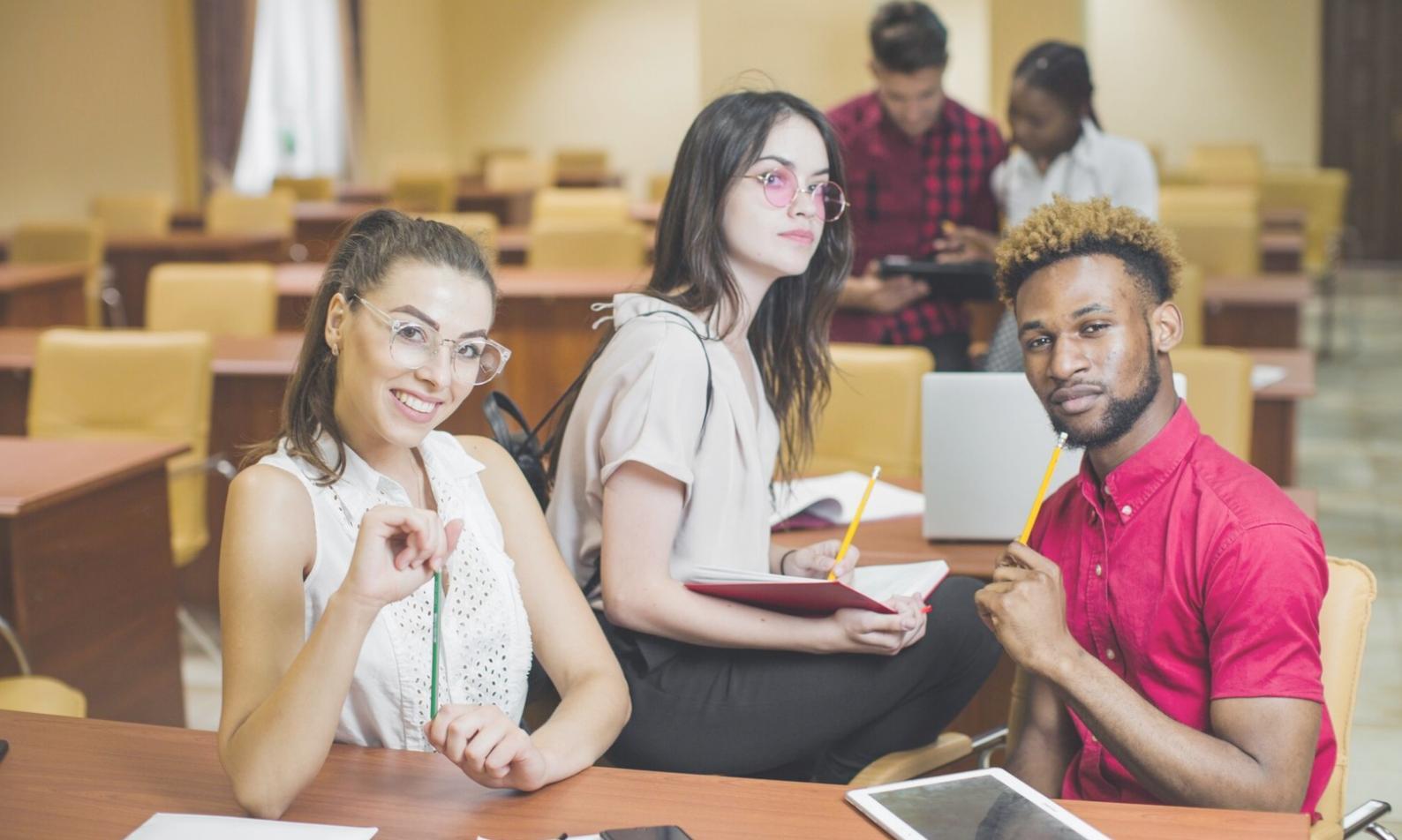 Team member reviewing financial education materials and program details