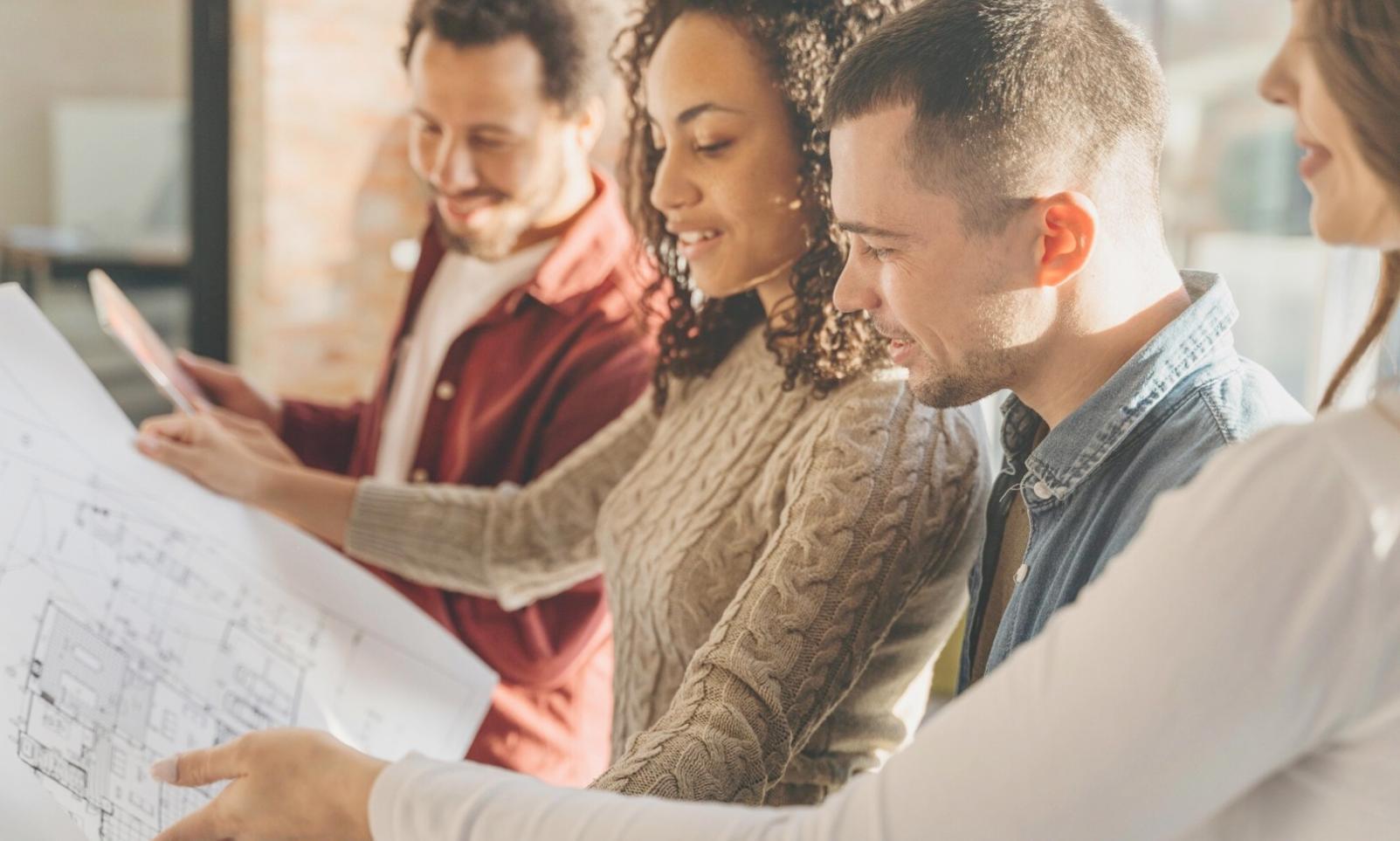 Workshop participants collaborating on budget analysis exercise